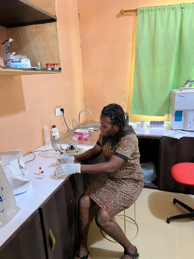 Laboratory technician preparing patient samples at Menesto Medical Center